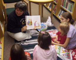 Tonya reading at Goodnight Garrett